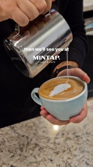 Pouring art in light blue cup