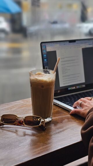 Laptop with iced coffee